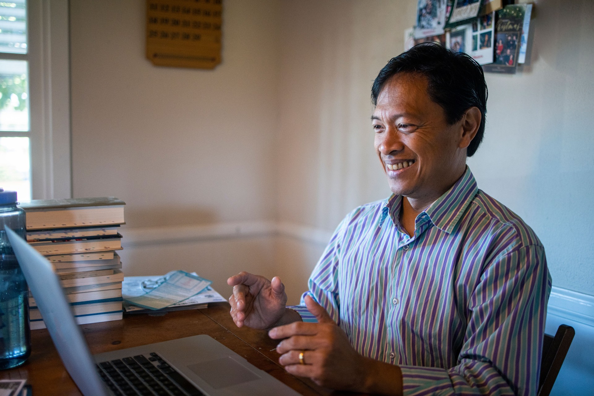 Mature Filipino Man Working from Home