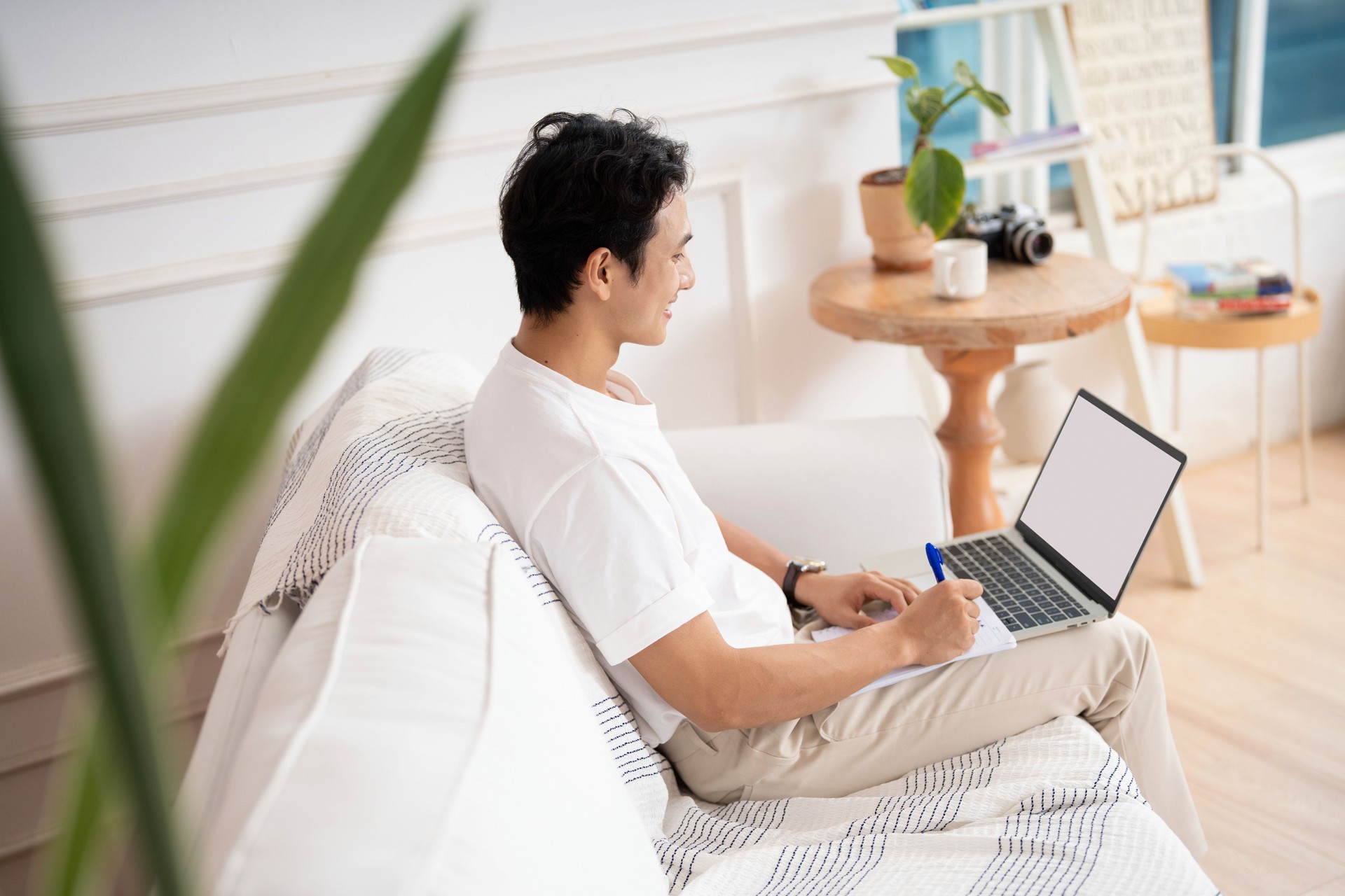 Photo of young Asian man at home